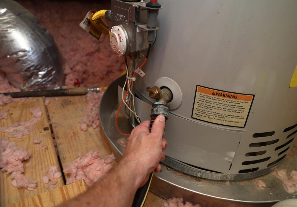 cluttered water heater space